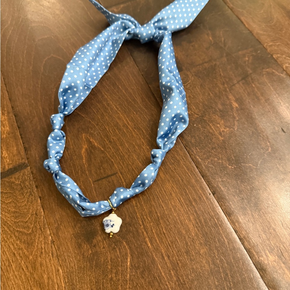 Handmade scarf necklaces  with charms .